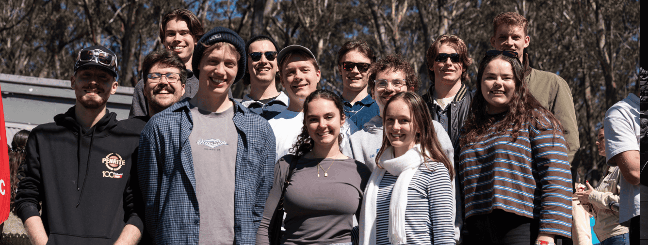 Group of young people smiling outdoors at Katoomba Christian Convention during Spark 2026 event.